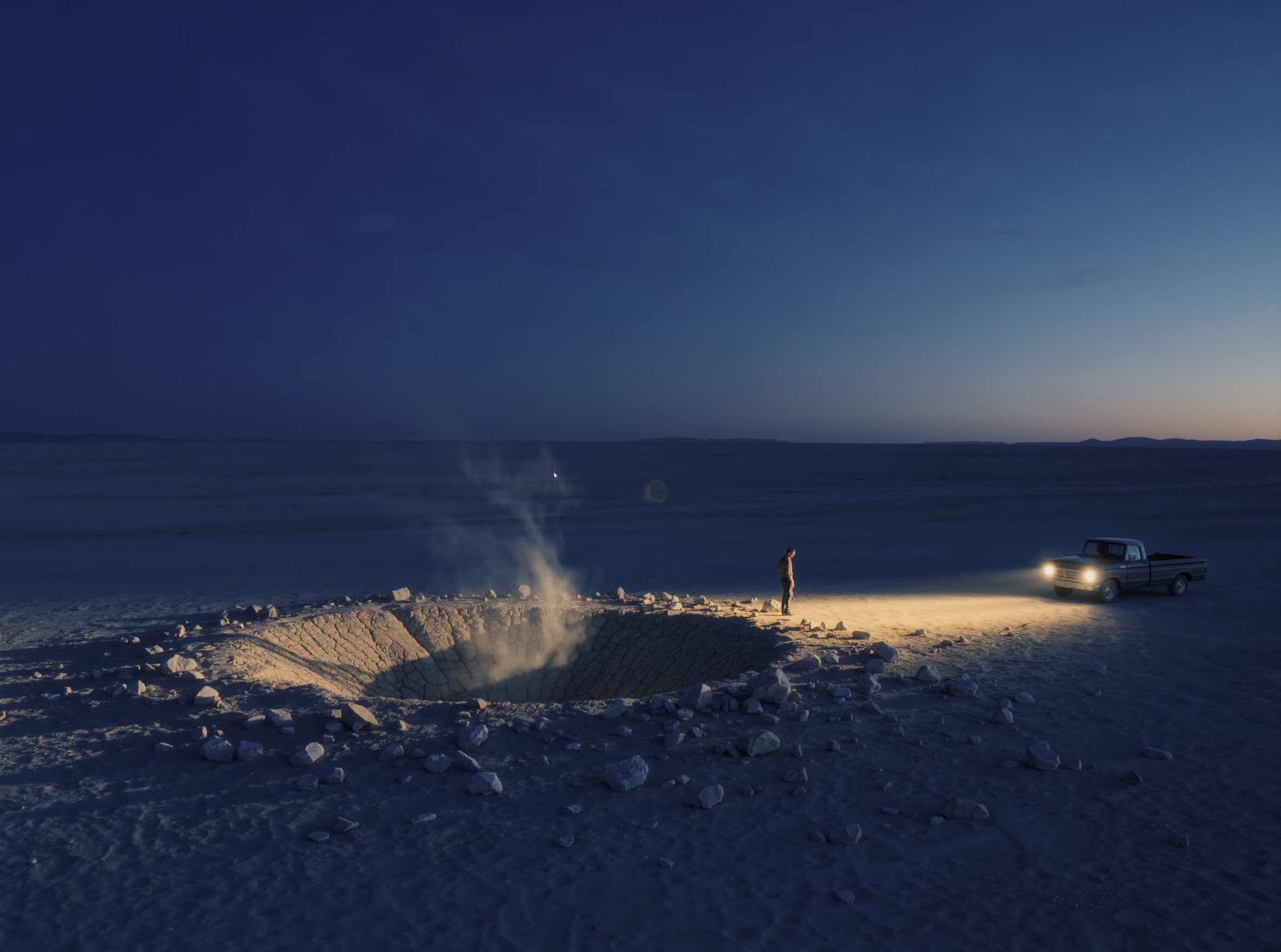 A meteorite crater in the desert at blue hour